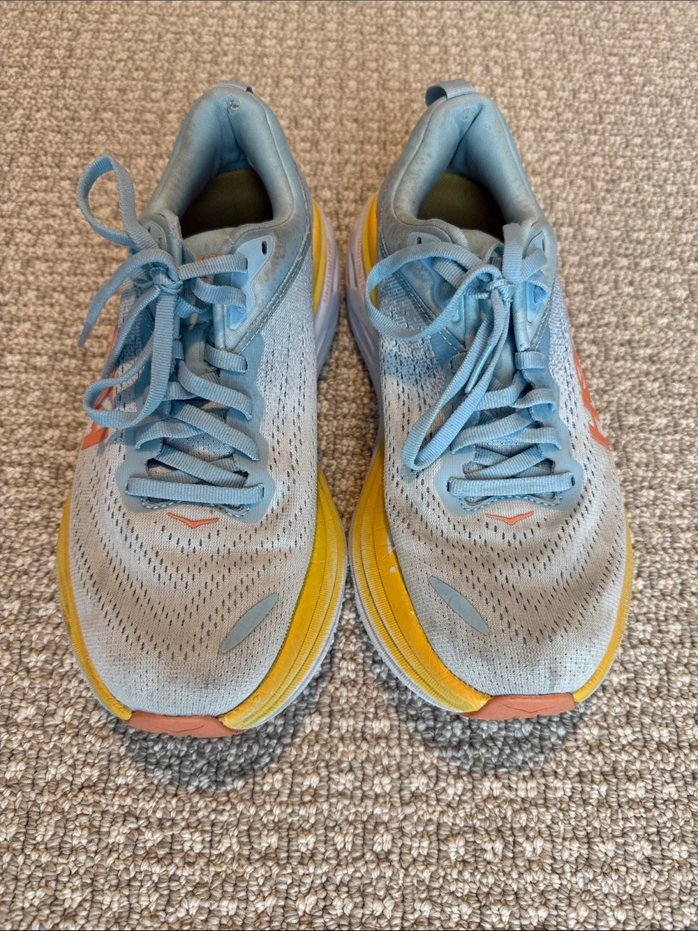 Hoka Light Blue Running Shoes with Yellow and Coral Accents